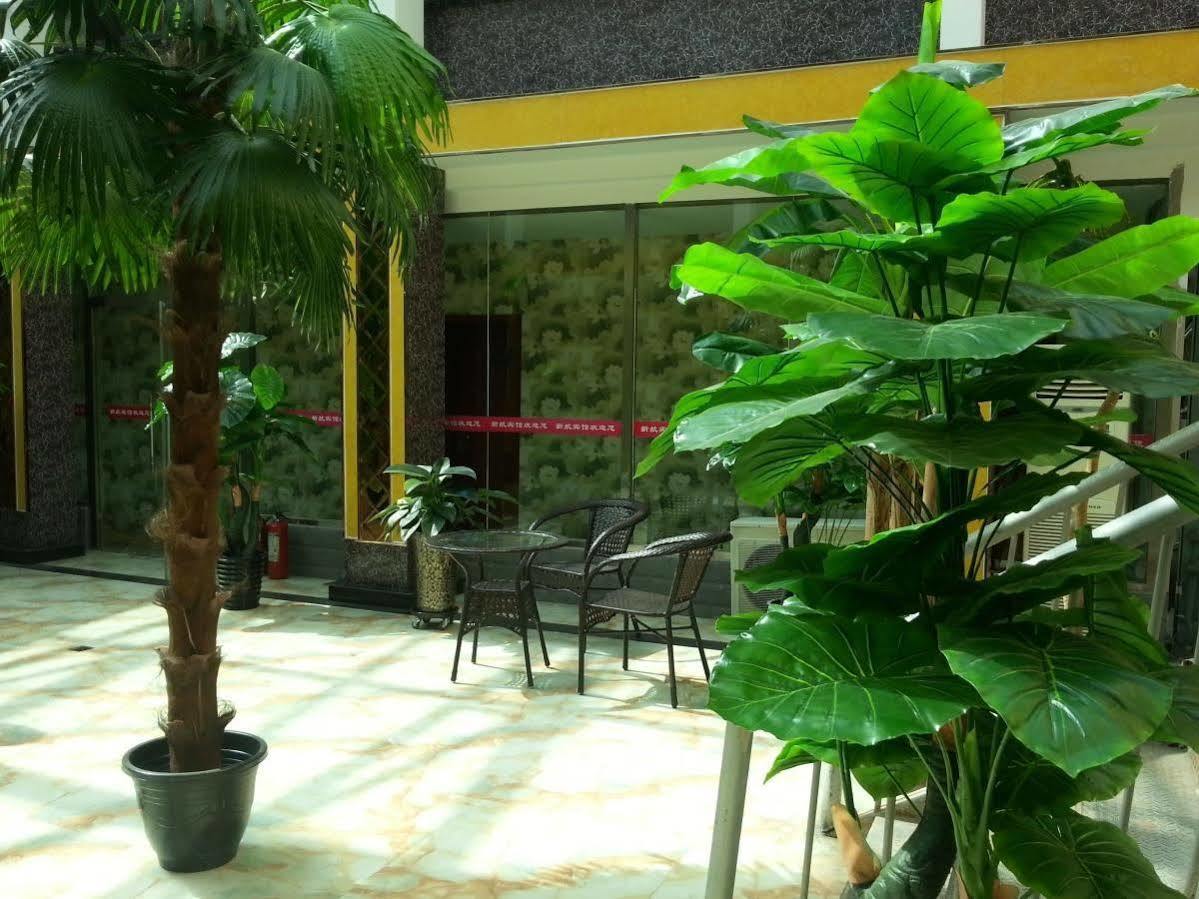 Xinhang Hotel Urumqi Exterior foto